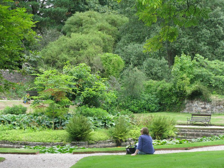 girl looking at the gardens in cothele.